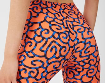 Legging orange à motif stylé