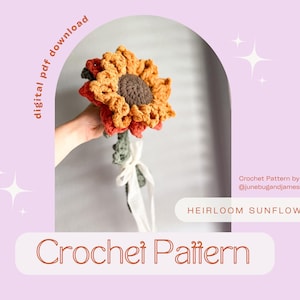 May include: Crochet pattern for a heirloom sunflower, featuring a crocheted sunflower with orange and yellow petals, a green stem, and a white ribbon. The pattern is available as a digital PDF download. The text "Crochet Pattern" is written in a red font on a white background.