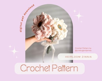 May include: A crochet pattern for a bouquet of heirloom zinnias, featuring two flowers in pink and white. The pattern is available as a digital PDF download. Crochet Pattern by @junebugandjames.