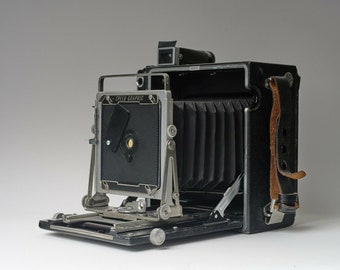 Speed and Crown Graphic pinhole board with interchangeable pinhole inserts