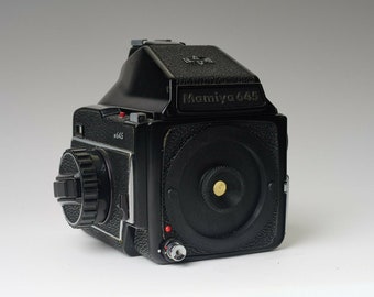 Tapa estenopeica Mamiya 645 con insertos estenopeicos intercambiables