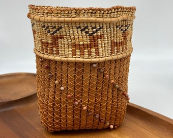 Handwoven small basket by artist Chris Warren