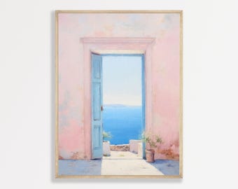 May include: A framed wall art print depicting an open light blue door set within a textured pastel pink wall. The doorway reveals a view of a bright blue sea under a clear sky, with a small potted green plant placed on the stone floor nearby.