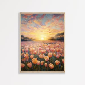 May include: A framed wall art print depicting a field of orange and pink tulips under a sunset sky. The sun sits low on the horizon, casting a warm glow over the flowers and the clouds above, which are painted in shades of yellow, orange, and blue.