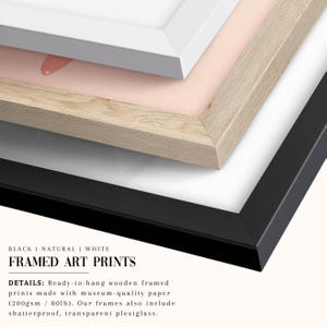 a picture frame with a pink and white background