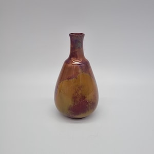 A Bernard Moore Studio Pottery Long Necked Vase With 'Gold Flambe' Glaze Shape 1092.