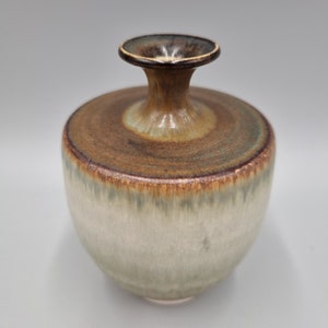 A Studio Pottery Footed Vase From Hoganas, Sweden By Goran Bergh.