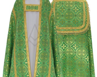 May include: Green liturgical cope with gold trim and a pattern of circles and crosses. The cope has a hood and a decorative collar.