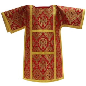 May include: Red and gold liturgical vestment with a pattern of angels and chalices. The vestment has a square neckline and short sleeves.