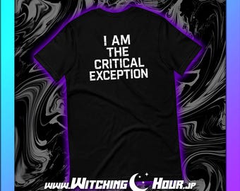 May include: Black t-shirt with the white text "! AM THE CRITICAL EXCEPTION". The shirt has a crew neck and short sleeves. The website address "www.WitchingHour.jp" is printed at the bottom of the shirt.