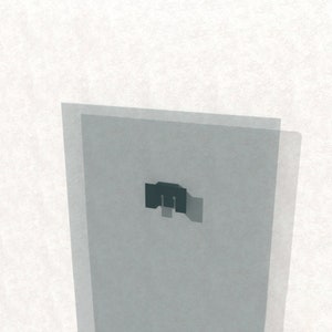 May include: A close-up of a clear glass panel with a black metal bracket attached to the back. The bracket is designed to hold a shelf or other object.
