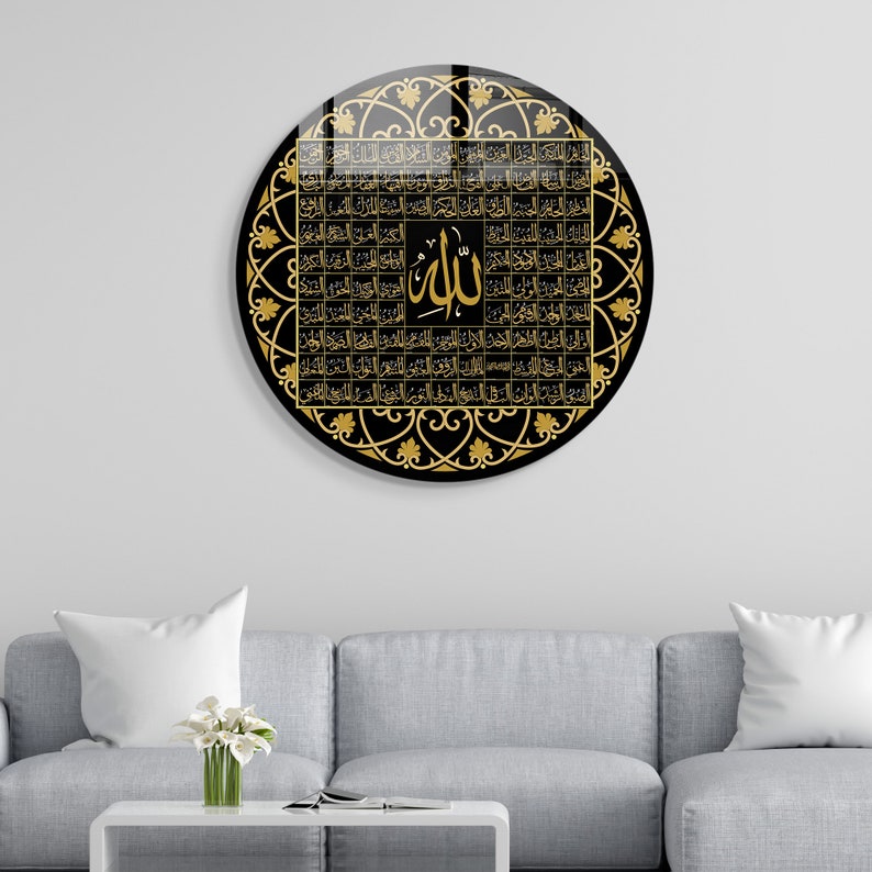 May include: A round black and gold wall clock with an intricate design featuring Arabic calligraphy and the word "Allah" in the center.