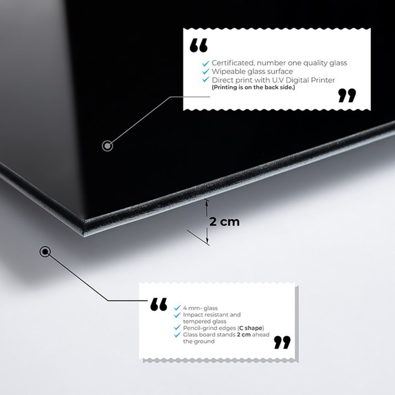May include: A black glass whiteboard with rounded edges. The board is 2 cm thick and stands 2 cm off the ground. The board is wipeable and can be printed on with a UV digital printer. The text on the board reads: "Certificated, number one quality glass, Wipeable glass surface, Direct print with UV Digital Printer (Printing is on the back side.)"