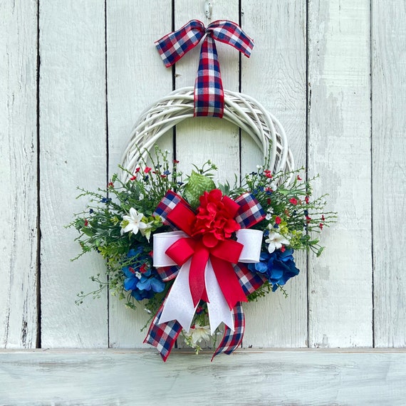 Red and White Wreath Stand - VIP Floral Designs