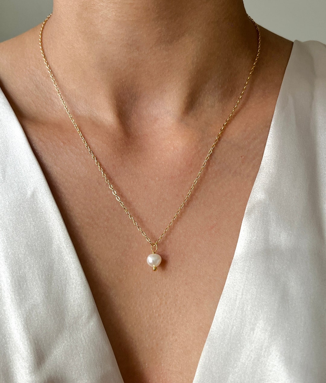 ネックレス・ペンダント [fillow] mini pearl cupid necklace il_fullxfull.4352962608_p90a.jpg