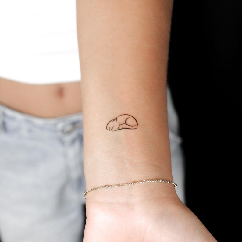 twoweektattoos Sleepy Cat Tattoo