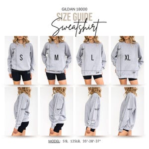 May include: Size guide for Gildan 18000 sweatshirts, showing measurements for sizes S, M, L, and XL. The model is 5'8" and 125 lbs, wearing a grey sweatshirt.