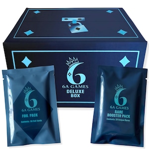 May include: A navy blue deluxe box set with a lock design, two foil packs, and the text "6A GAMES DELUXE BOX". The foil pack reads "6A GAMES FOIL PACK Contents: 30 Foil Cards". The rare booster pack reads "6A GAMES RARE BOOSTER PACK Contents: 30 Unique Rares".