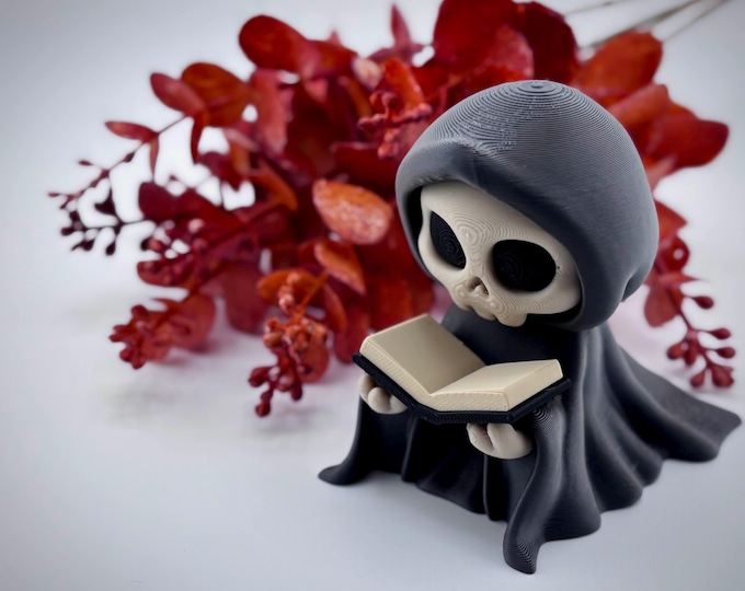 Reading Reaper Figurine: Spooky Bookworm Desk Decor