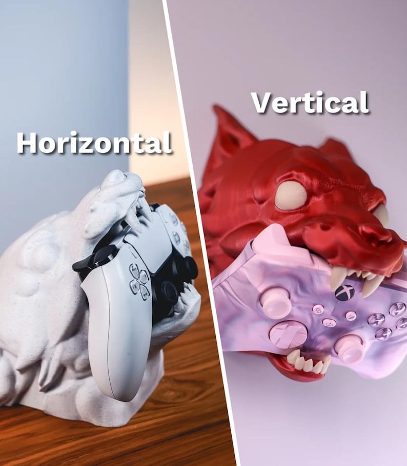 May include: Two 3D printed game controller holders, one in the shape of a wolf's head and the other in the shape of a dragon's head. The wolf's head is red and the dragon's head is white. The wolf's head is holding a purple and pink game controller vertically, while the dragon's head is holding a white game controller horizontally. The text "Vertical" is above the wolf's head and the text "Horizontal" is above the dragon's head.