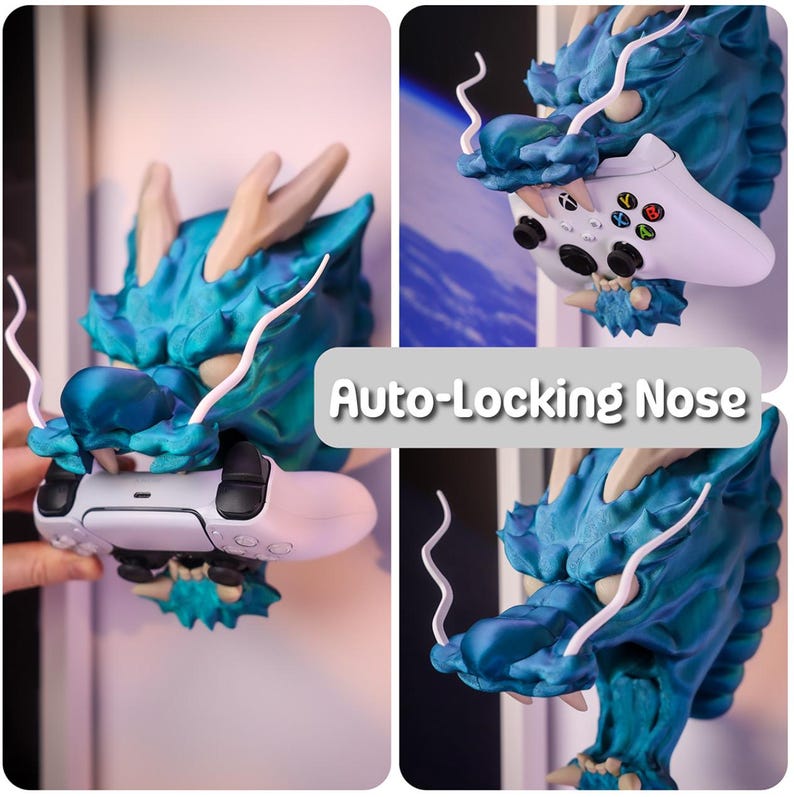 May include: A teal blue dragon-shaped wall mount with an auto-locking nose for a video game controller. The controller is white and has black buttons. The text "Auto-Locking Nose" is printed on a gray rectangle.
