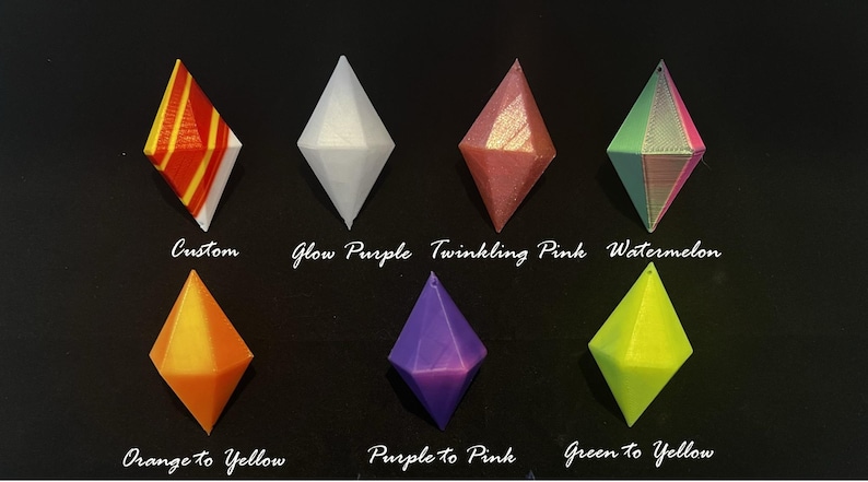 May include: Ten different colour options for a diamond-shaped resin charm. The colours include orange to yellow, purple to pink, green to yellow, glow purple, twinkling pink, watermelon, and custom.