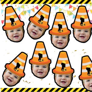 May include: Eight printable photo booth props featuring a baby's face in a construction cone hat with the number one and a small construction vehicle. The cones are orange and white with black stripes.