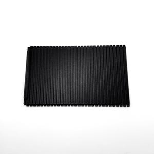 May include: Black corrugated plastic sheet with a textured surface.