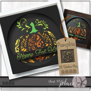 Peut inclure: Une boîte à ombre 3D avec une découpe de citrouille avec un motif floral. La citrouille est orange, jaune et verte. La boîte est noire et a une bordure blanche. Le texte "Happy Fall Ya'll" est sur la boîte. Le texte "Pumpkin" est sur une étiquette brune avec une découpe 3D d'une citrouille. L'étiquette indique également "3D Shadow Box" et contient des icônes pour SVG, PNG, DXF et EPS.