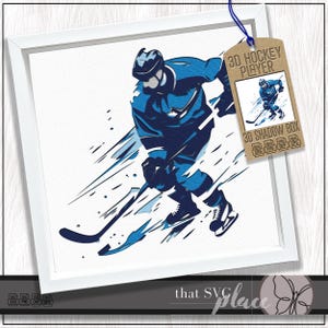 May include: A framed print depicting a hockey player in shades of blue, with a dynamic, abstract background. The player is shown in action with a hockey stick. The tag reads "3D Hockey Player 3D Shadow Box".