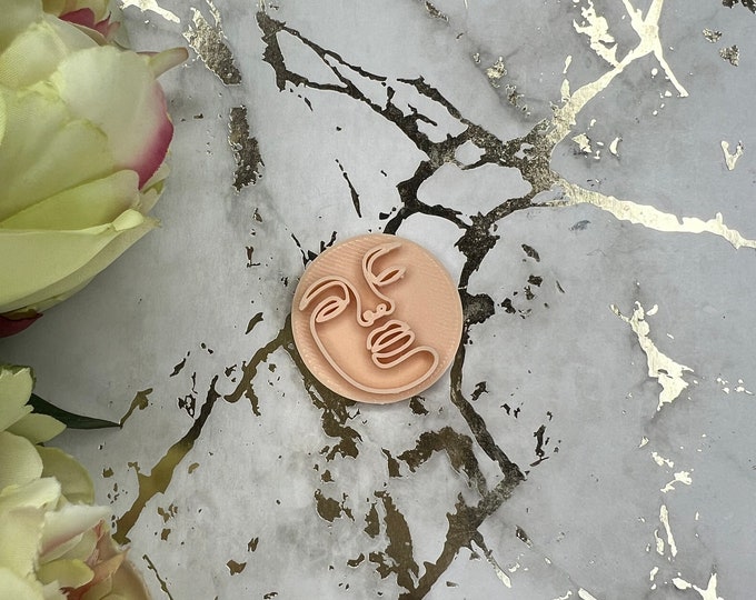 Face 5 polymer clay stamp