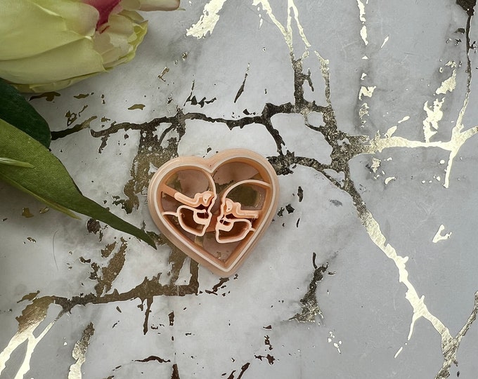Heart with skulls polymer clay cutter