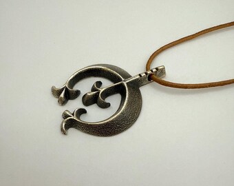Tufa Cast Sterling Silver Naja Pendant by Aaron Anderson, Navajo