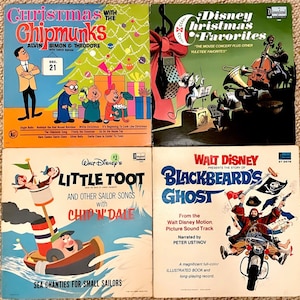May include: Four vintage vinyl records featuring Christmas and children's themes. The top left record features the Chipmunks, the top right record features Disney Christmas Favourites, the bottom left record features Little Toot with Chip 'n Dale, and the bottom right record features Blackbeard's Ghost.