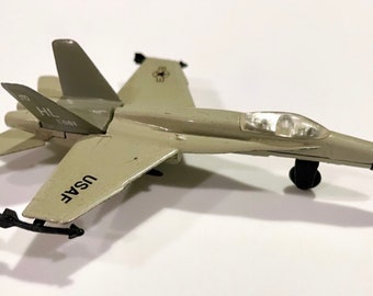 Vintage F-18 Hornet Fighter Plane Military Jet Aircraft Gray Vintage F-18 Hornet Fighter Plane Military Jet Aircraft Gray