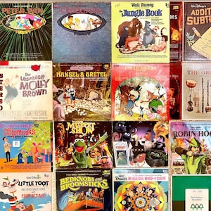 May include: A collection of vintage vinyl records featuring classic Disney characters and stories, including Peter Pan, Cinderella, The Jungle Book, The Unsinkable Molly Brown, Hansel and Gretel, Uncle Wiggly, The Muppet Show, Robin Hood, Bedknobs and Broomsticks, and The Wonderful World of Color. The records are in various colors and feature illustrations of the characters.