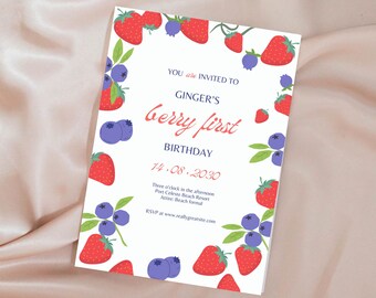 May include: A white invitation card with a red and blue berry theme. The text reads "You are invited to Ginger's Berry First Birthday 14-08-2030 Three o'clock in the afternoon Port Celeste Beach Resort Attire: Beach formal RSVP at www.reallygreatsite.com"