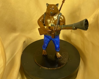 Bamboo the Bear-man character with a Banjo
