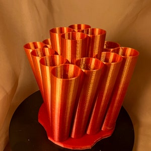 Tubular Multi-section Brush Holder