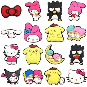 Op de afbeelding: Een set van 15 kleurrijke cartoonfiguur strijklabels. De personages omvatten Hello Kitty, My Melody, Little Twin Stars, Keroppi en Badtz-Maru. De patches zijn perfect om een ​​toets van whimsy toe te voegen aan kleding, tassen en andere accessoires.