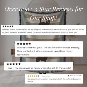 May include: A woven blanket with a light blue, tan, and white striped pattern, featuring a silhouette of an animal. The image includes customer reviews and the text "Over 600+ 5 Star Reviews for Our Shop!"