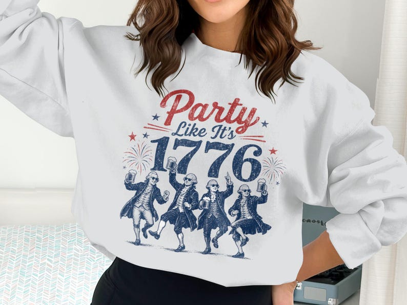 Crewneck sweatshirt with "Party Like It's 1776" and dancing figures.