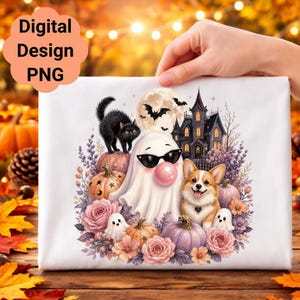 May include: A white fabric surface featuring a digital illustration of a ghost wearing sunglasses and blowing a pink bubble, a black cat, a corgi, a haunted house, pumpkins, and flowers. The text Digital Design PNG is printed in the top left corner.