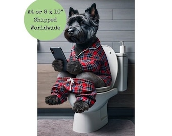 May include: A black and white dog wearing red and black checked pyjamas sits on a white toilet and uses a smartphone.