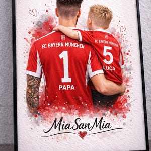 May include: Framed print featuring a father and child in red soccer jerseys with the text "FC Bayern M&uuml;nchen." The father's jersey has the number 1 and the word "PAPA," while the child's jersey has the number 5 and the name "LUCA." The print includes the phrase "Mia San Mia."