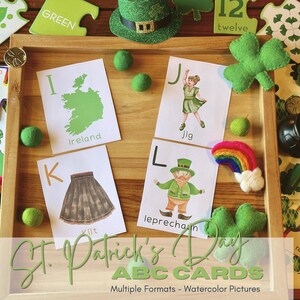 May include: St. Patrick's Day ABC cards with watercolor illustrations. The cards feature letters of the alphabet and Irish-themed words like "Ireland", "Kilt", "Jig", and "Leprechaun".