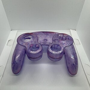Transparent Nintendo Gamecube case - iridescent violet, red and black