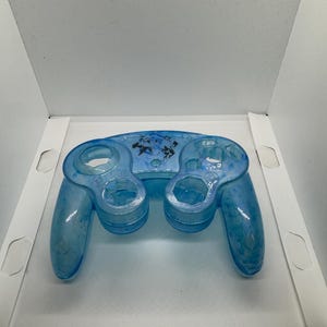 Nintendo Gamecube case, transparent blue, Fox and Falco