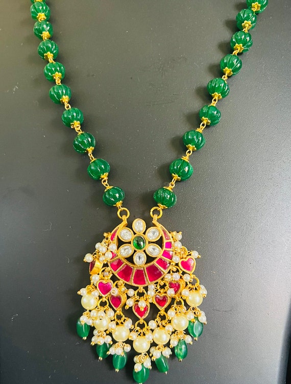 Green beads chain with gold pendant hotsell