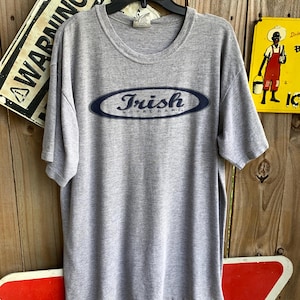 Vintage 90s Grey and blue Notre Dame Irish vintage t-shirt tee Size L by Gear for Sports made in USA